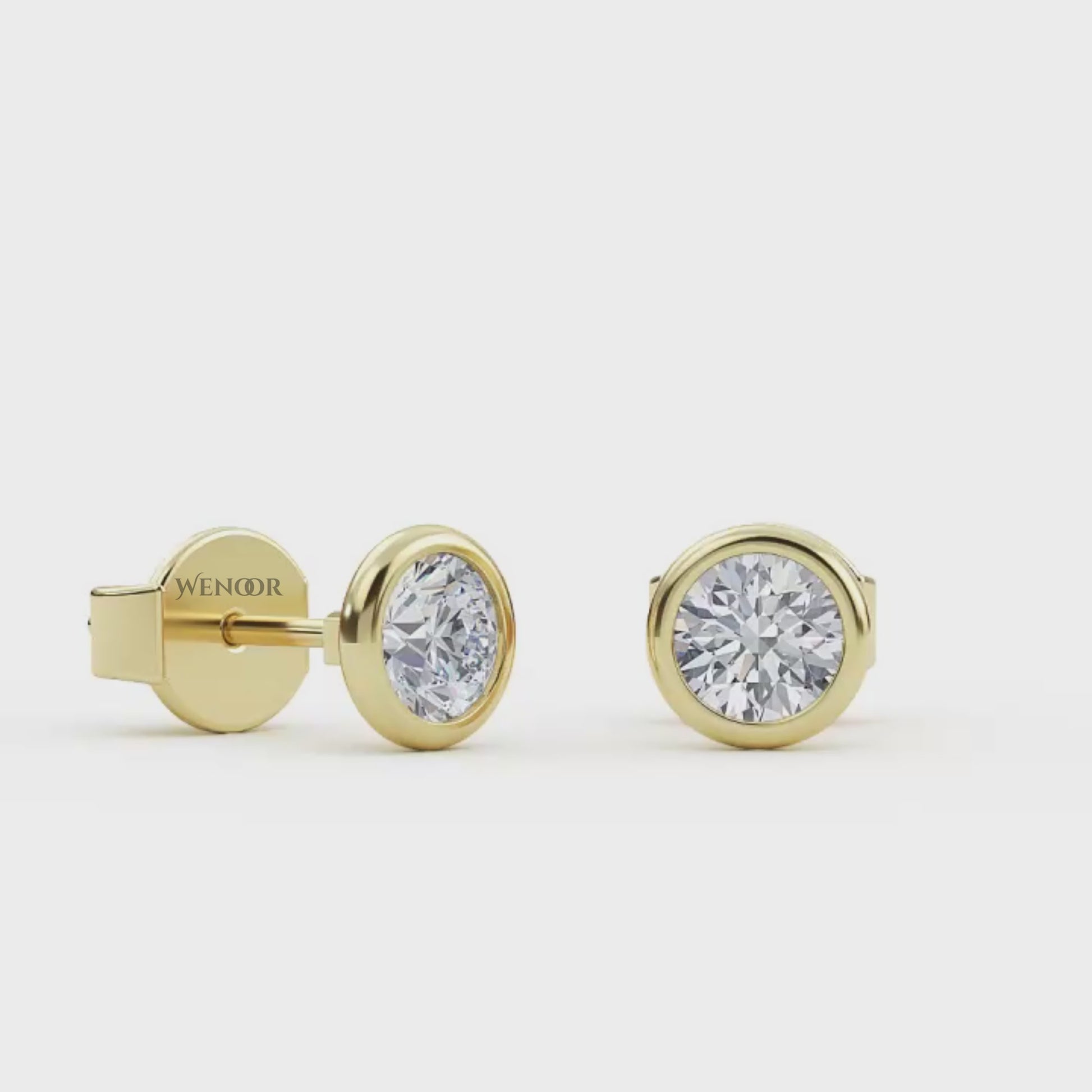 Round Cut Lab Grown Diamond Bezel Stud Earrings in Gold