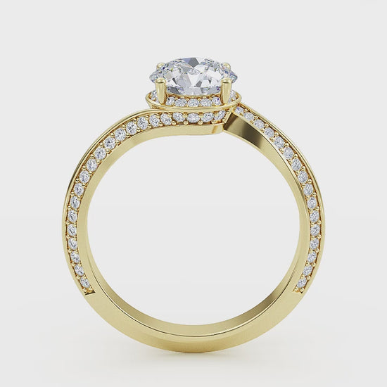 Woman wearing round cut lab-grown diamond ring on hand, sunlight highlighting its fire and scintillation"