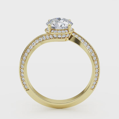 Woman wearing round cut lab-grown diamond ring on hand, sunlight highlighting its fire and scintillation"