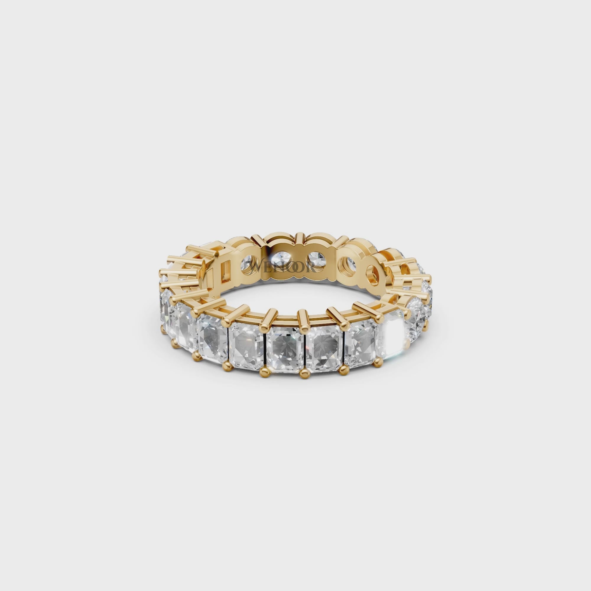 Sustainable lab grown diamond engagement ring with a radiant cut center and round brilliant side stones.