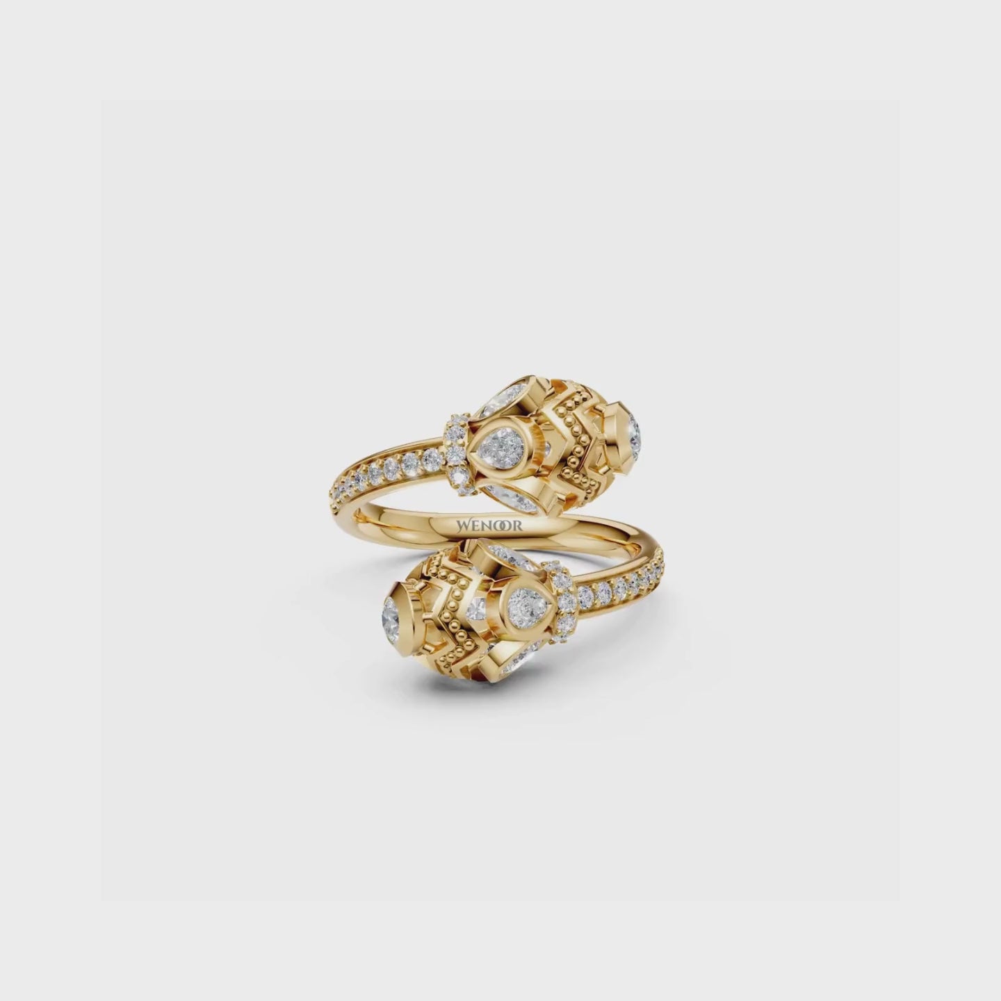 Dainty 14K gold wedding Ring with round and pear cut lab diamonds for a love story as timeless as its vintage design.