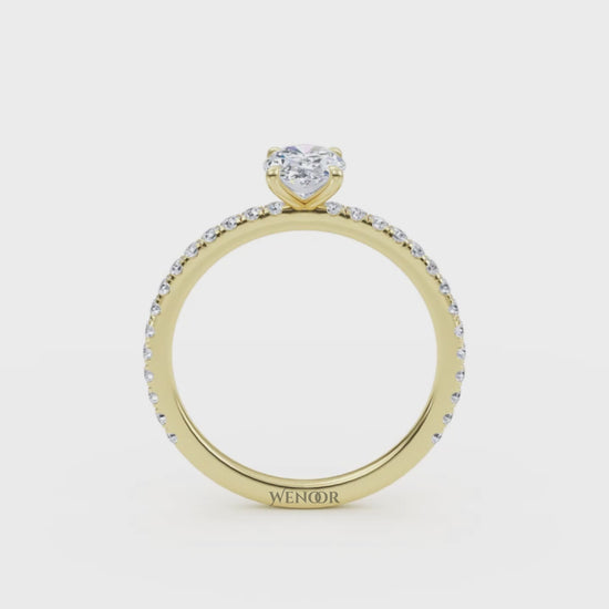 Luxury oval cut lab grown diamond engagement ring in 18K yellow gold