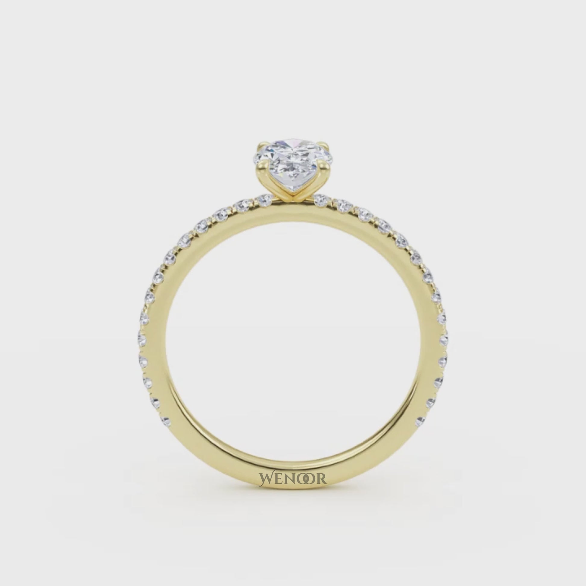 Luxury oval cut lab grown diamond engagement ring in 18K yellow gold