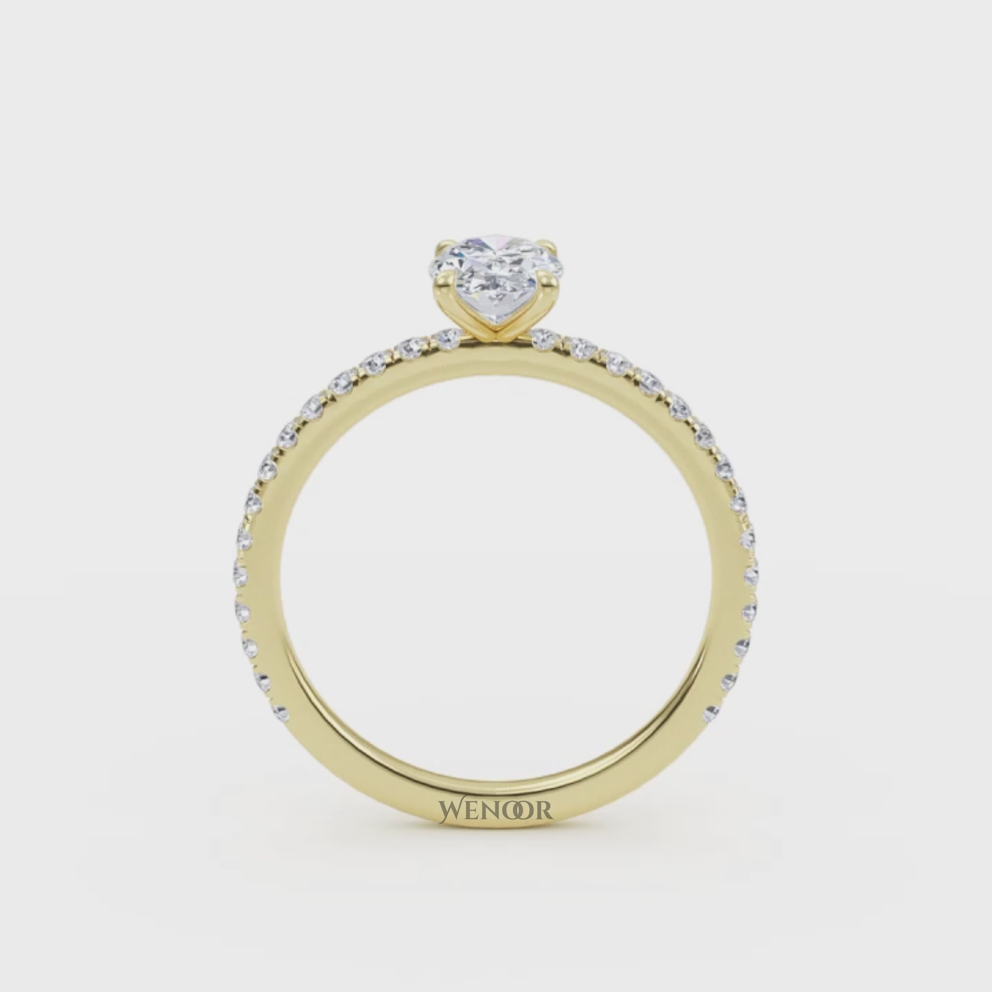 Luxury oval cut lab grown diamond engagement ring in 18K yellow gold